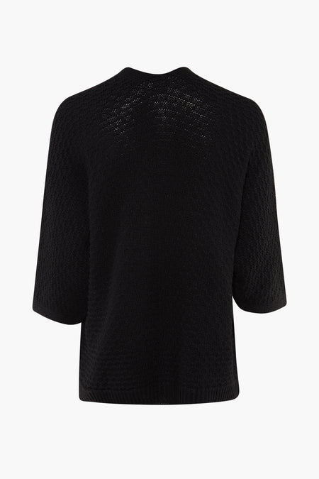 Cardigan noir de Terra di Siena, avec une texture fine tricotée et des manches courtes, vu de derrière.