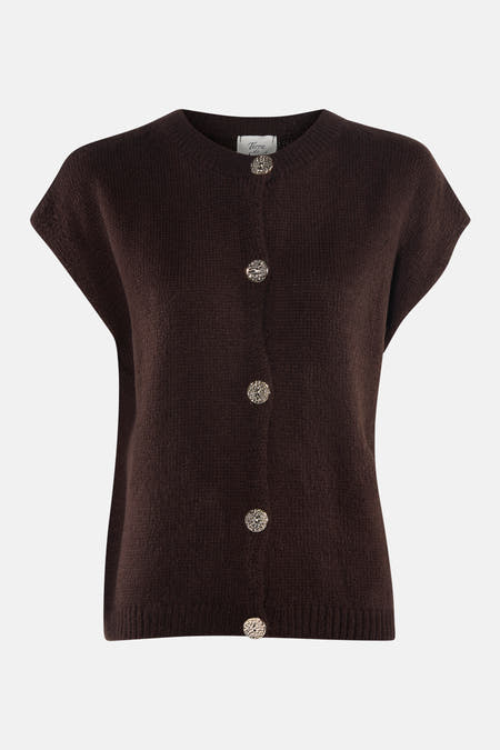 Veste brune de Terra di Siena, texture tissée et design sans manches.