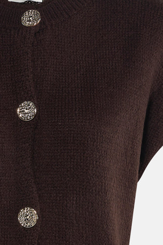 Veste brune de Terra di Siena avec des boutons décoratifs et une texture finement tissée.