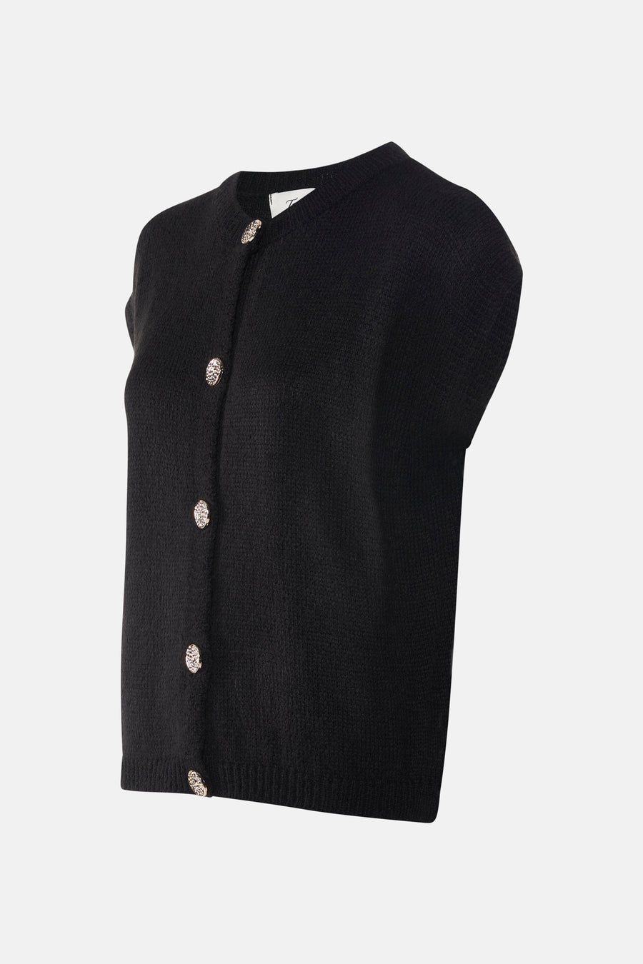 Veste noire de Terra di Siena avec des boutons décoratifs, photographiée d'un angle oblique.