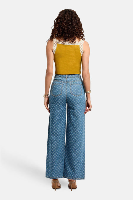 Jean en mid blue de Morgan De Toi, avec un motif à carreaux et une large jambe.