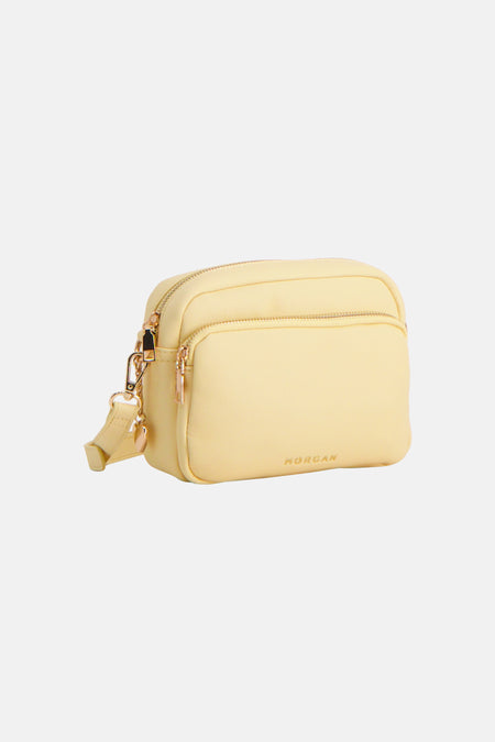Sac à bandoulière jaune de Morgan De Toi avec plusieurs compartiments zippés, ferrures dorées et logo en relief.
