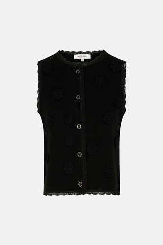 Gilet noir de Morgan de Toi, avec détails de fleurs tricotées et finition en dentelle le long des bords.