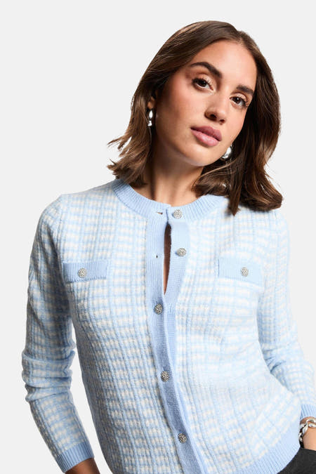 Veste bleue de Morgan De Toi avec longues manches, fermeture à boutons et détails élégants.