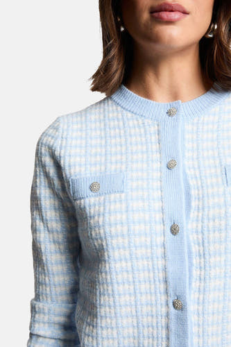 Veste bleue de Morgan De Toi, avec une texture rugueuse et des boutons décoratifs.