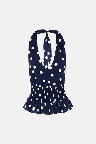 Haut bleu marine Morgan De Toi à pois blancs, col licou, taille smockée et volants à l'ourlet.