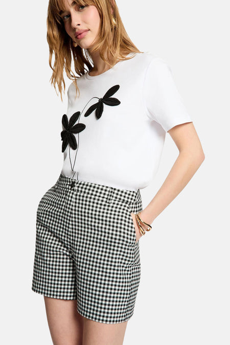 Short noir Morgan De Toi avec un motif à carreaux noir et blanc.