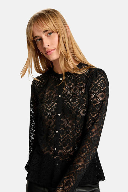 Blouse noire à manches longues de Morgan De Toi, avec des détails bordés et une fermeture à boutons.