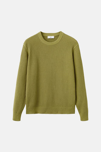Pull vert avec col rond de MANGO, avec une structure gaufrée et des bords côtelés.