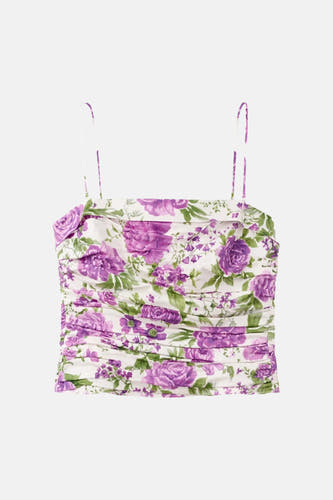 Haut courte blanche à imprimé fleurs violettes de MANGO, avec de fines bretelles spaghetti.