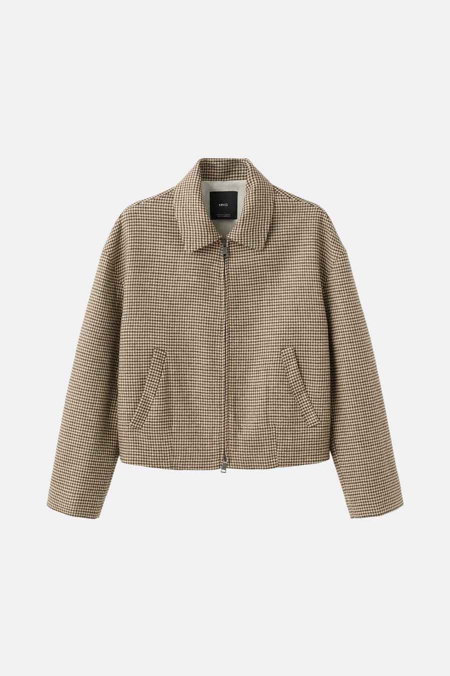 Blazer multicolore de MANGO, avec un motif carreaux de guepard et une fermeture à glissière devant.