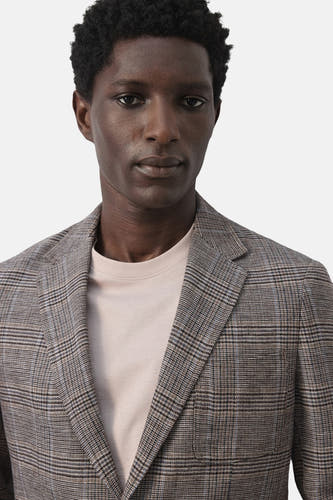 Blazer multicolore de MANGO, avec un motif à carreaux et un col à revers.