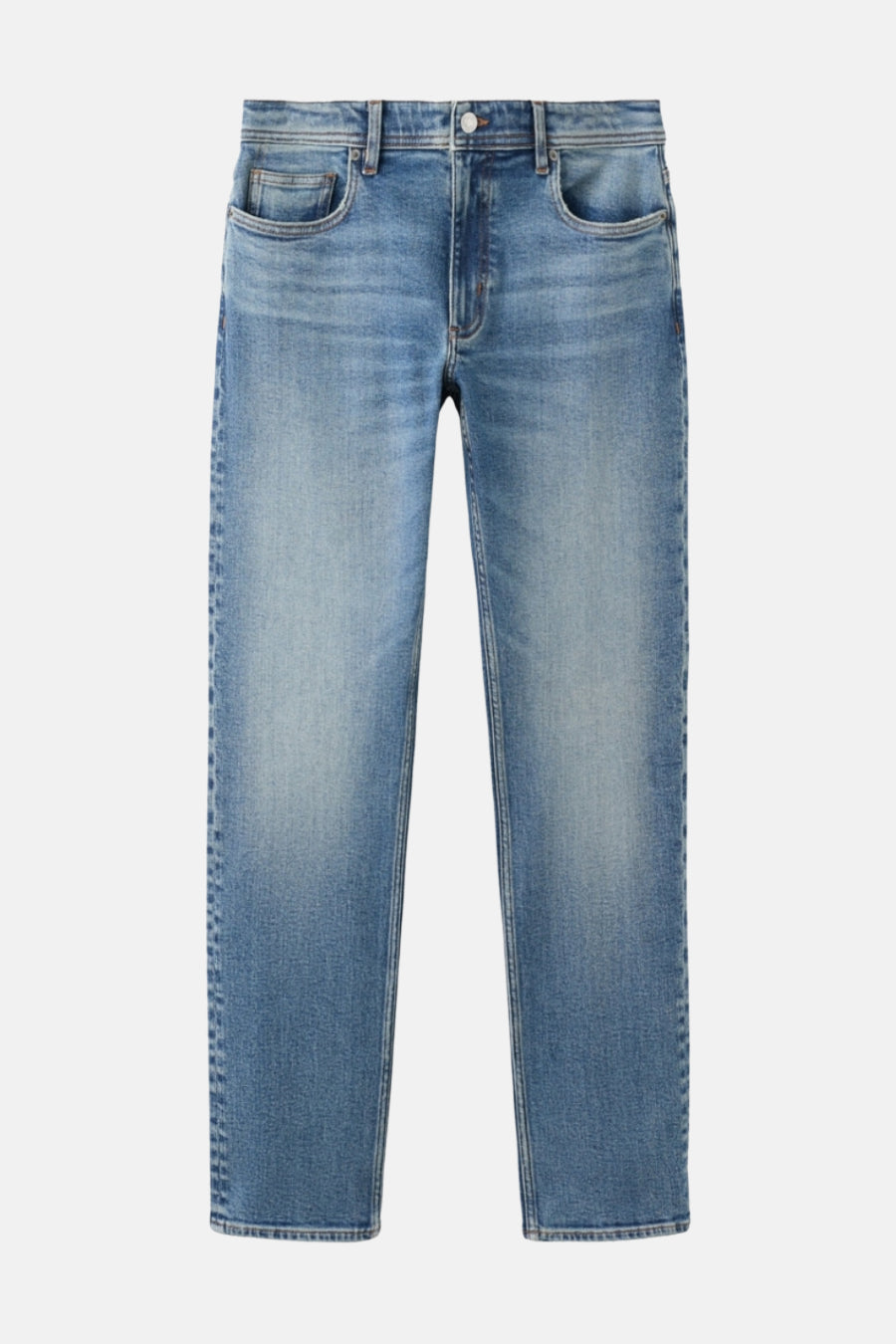 Jean slim en denim bleu moyen de MANGO, avec un lavage subtil et une coupe cinq poches classique.