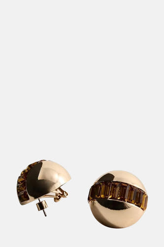 Boucles d'oreilles en or de MANGO avec des accents ambre autour.