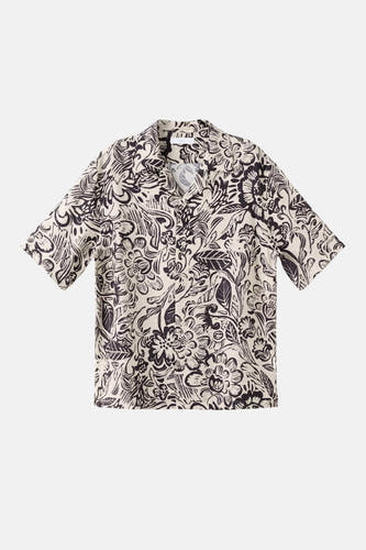 Chemise beige à manches courtes de MANGO avec un motif floral noir et un col cubain.