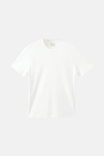 T-shirt blanc à manches courtes de MANGO, couleur unie et col rond.