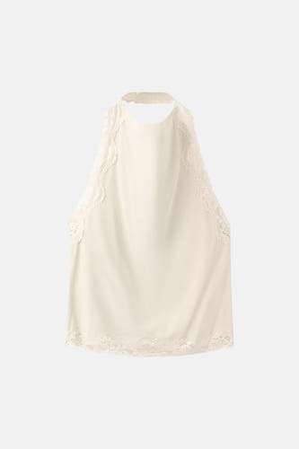 Haut écru de MANGO avec col licou en dentelle et ourlet en dentelle.