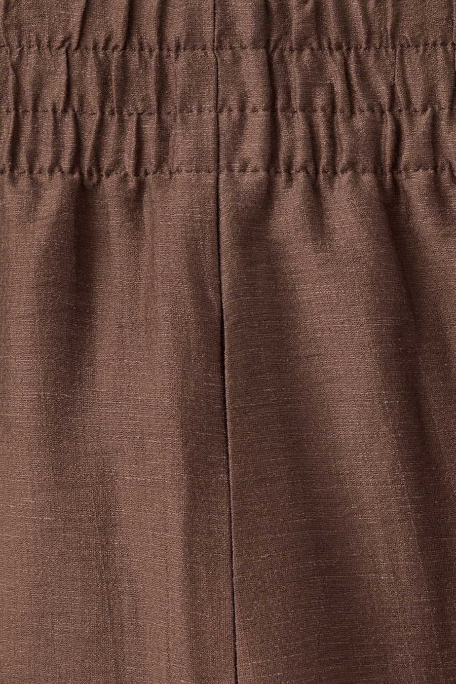 Bruine broek van MANGO met een geplooide elastische tailleband en verticale naad.