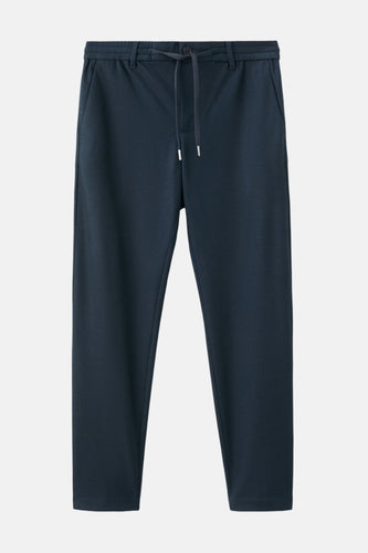 Donkerblauwe broek met trekkoord.