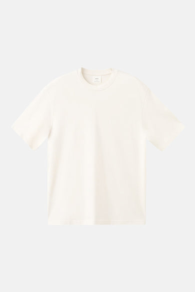 T-shirt écru à manches courtes de MANGO, uni et à col rond.