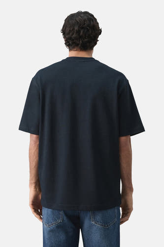 Blauw T-shirt met korte mouwen van MANGO, gezien van achteren met een casual pasvorm.