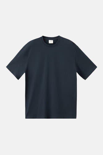 T-shirt bleu à manches courtes de MANGO, couleur unie et coupe décontractée.