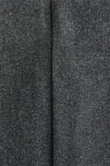 Grijze wollen stof met naad.