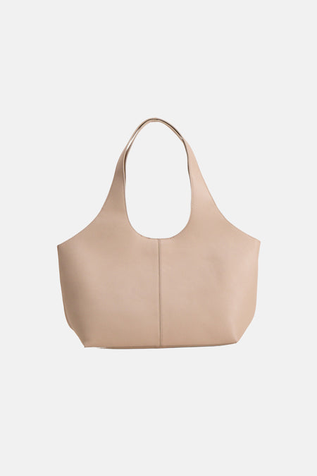 Sac à bandoulière beige de MANGO avec une texture lisse et un design minimaliste.