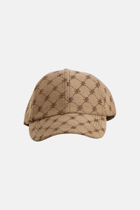 Casquette marron MANGO, avec un imprimé logo intégral et une sangle réglable à l'arrière.