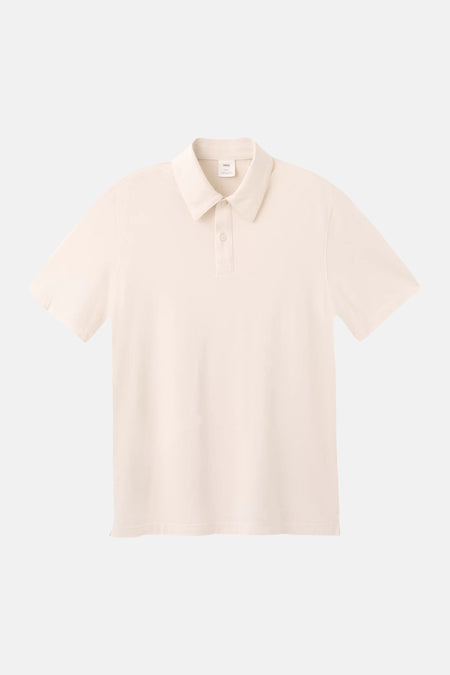 Polo écru de MANGO avec col classique et deux boutons, vue de face.