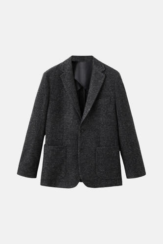 Blazer multicolore de MANGO, avec des manches longues, un col et des poches sur la partie avant.