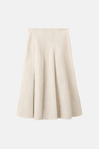 Jupe longue beige de MANGO avec plis et une silhouette trapèze.