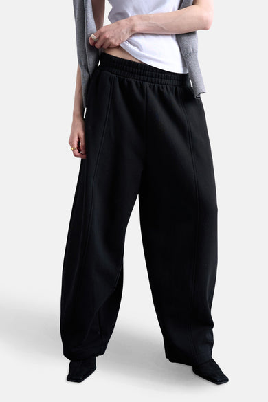 Pantalon de jogging noir de TOPSHOP, avec une ceinture élastique large et des coutures verticales.