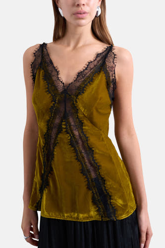 Groene blouse zonder mouwen van TOPSHOP, afgewerkt met zwart kant langs de randen en v-hals.