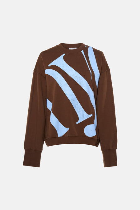 Pull marron à col rond de TOPSHOP, avec un motif graphique bleu clair frappant sur le devant.
