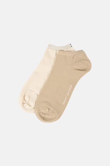 Chaussettes beiges de TOMMY JEANS, avec un bord côtelé et un petit logo.
