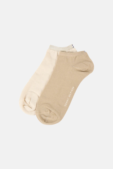 Chaussettes beiges de TOMMY JEANS, avec un bord côtelé et un petit logo.