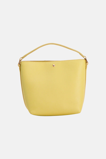 Gele handtas van MANGO met textuur, goudkleurige sluiting en schouderband, front view
