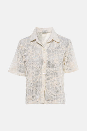 Chemisier beige à manches courtes de Terra di Siena, avec motif floral et fermeture à boutons.