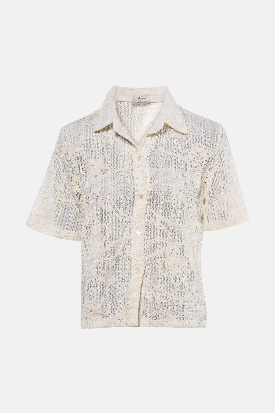 Chemisier beige à manches courtes de Terra di Siena, avec motif floral et fermeture à boutons.
