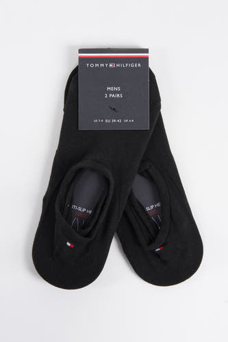 Chaussettes noires de Tommy Hilfiger, avec une semelle anti-dérapante et une taille indiquée sur un étiquette.