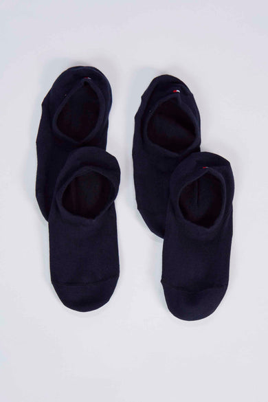 Chaussettes invisibles bleu marine de TOMMY JEANS, avec détail rouge-blanc-bleu et insert en carton.