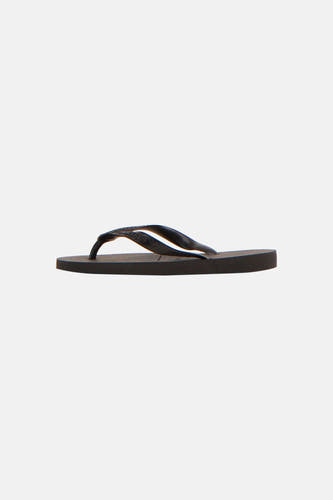 Tongs noirs Havaianas avec semelle rayée et lanières de marque, vue de profil.