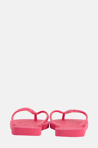 Chaussons roses Havaianas avec une texture lisse, vus de dos sur un fond blanc.