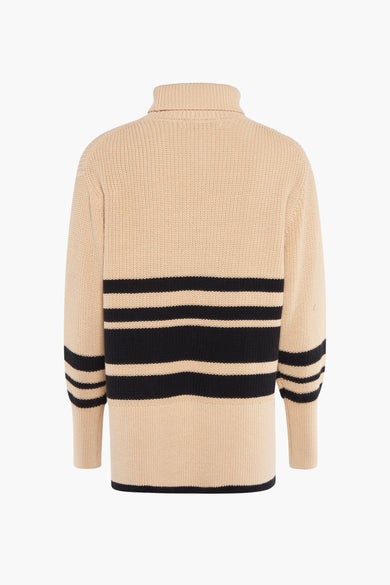 Gilet beige avec col montant de Pulz, avec des rayures noires sur le corps et les bras.