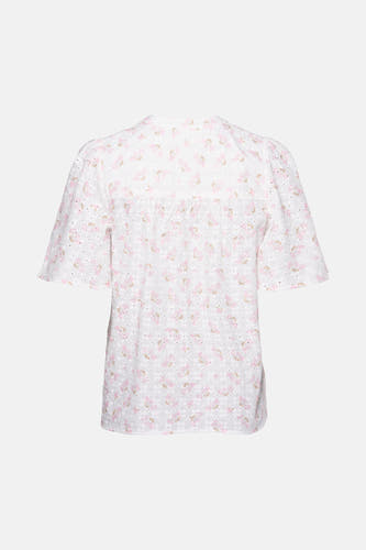 Blouse blanche à manches courtes de PULZ, avec imprimé de fleurs roses et détails brodés.