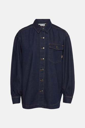 Chemise de jeans bleu marine de PULZ, avec des manches longues, une fermeture à boutons et une poche poitrine.