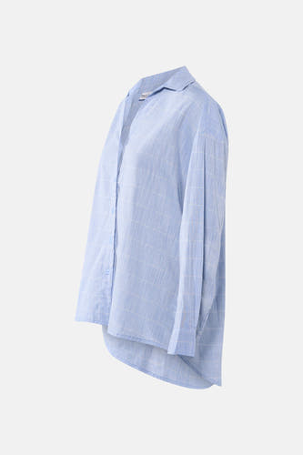 Chemise bleue à manches longues de PULZ, avec un motif à carreaux et une fermeture à boutons.
