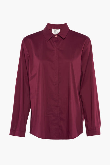 Blouse rouge à longues manches de Terra di Siena, avec un col et une fermeture à boutons.