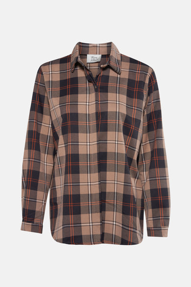 Blouse beige à longues manches de Terra di Siena, avec un motif rayé dans des tons bruns, orange et noirs.